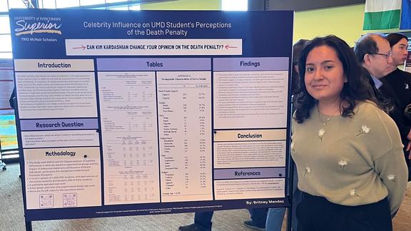 Britney Mendez (Criminology ‘24) presents a research poster.